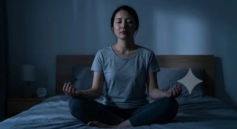 Mơ thấy rụng răng chảy máu: Giải mã điềm báo và bộ số may mắn 8 Người ngồi thiền trên giường thực hành bài tập hít thở sâu để giảm nhịp tim ban đêm
