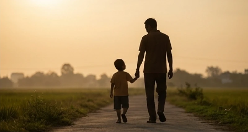Mơ thấy nói chuyện với bố đã mất: Điềm báo và góc nhìn tâm lý 2 Hình bóng người cha dắt tay con đi dưới ánh nắng dịu nhẹ của buổi sớm ban mai