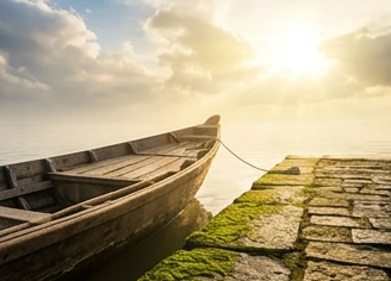 Mơ thấy đi đò qua sông: Điềm báo dòng nước và con số tài lộc 8 Mũi chiếc đò gỗ từ từ chạm vào bến đậu bằng đá rêu phong rực rỡ dưới ánh mặt trời sưởi ấm