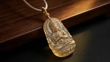 Mặt dây chuyền phong thủy tuổi tý tạc hình Phật bản mệnh Thiên Thủ Thiên Nhãn bằng đá tự nhiên