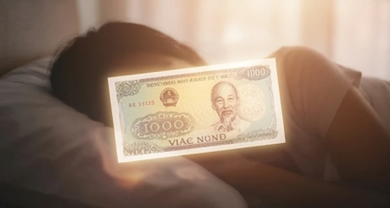 Mơ Thấy Tờ Tiền 1000: Giải Mã Điềm Báo & Sổ Mơ Số May Mắn 1 Một tờ tiền giấy mệnh giá nhỏ phát sáng mờ ảo trong không gian tâm trí người nằm ngủ