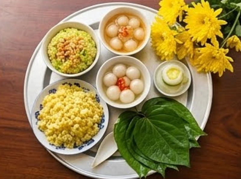 Mâm lễ cúng chay với xôi đỗ xanh, chè trôi nước, hoa cúc vàng và đĩa trầu cau tươi xanh