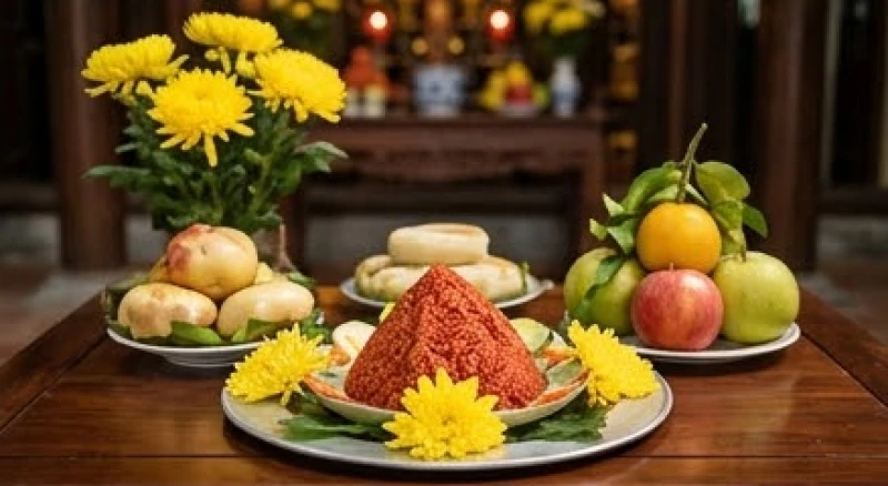 Mâm lễ chay dâng đền gồm oản đỏ, hoa cúc vàng tươi và các loại trái cây có hình dáng tròn trịa đẹp mắt