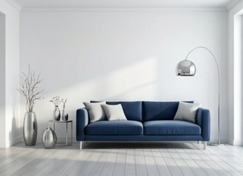 Phòng khách hiện đại sử dụng tông màu trắng xám làm chủ đạo kết hợp ghế sofa xanh dương hợp phong thủy