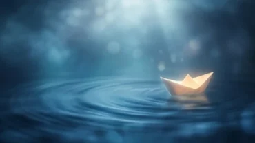 Trạng thái tâm lý khi mơ thấy người thân chết đuối được tái hiện qua chiếc thuyền giấy lẻ loi trên mặt nước