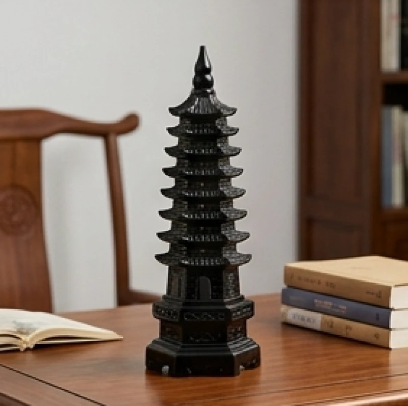 Vật phẩm phong thủy cho tuổi Dậu: Chuẩn ngũ hành nạp âm 9 Tháp Văn Xương phong thủy chín tầng chế tác từ đá núi lửa đen bóng đặt tinh tế trên bàn học tập