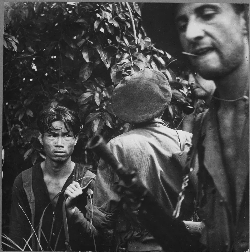 the french foreign legion is playing the major combat role in the war against the vietminh here a red suspect has been nara 541969 2 84be5ad9